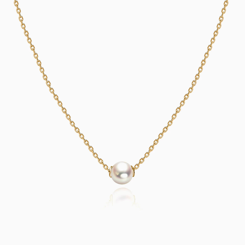 white pearl necklace gold